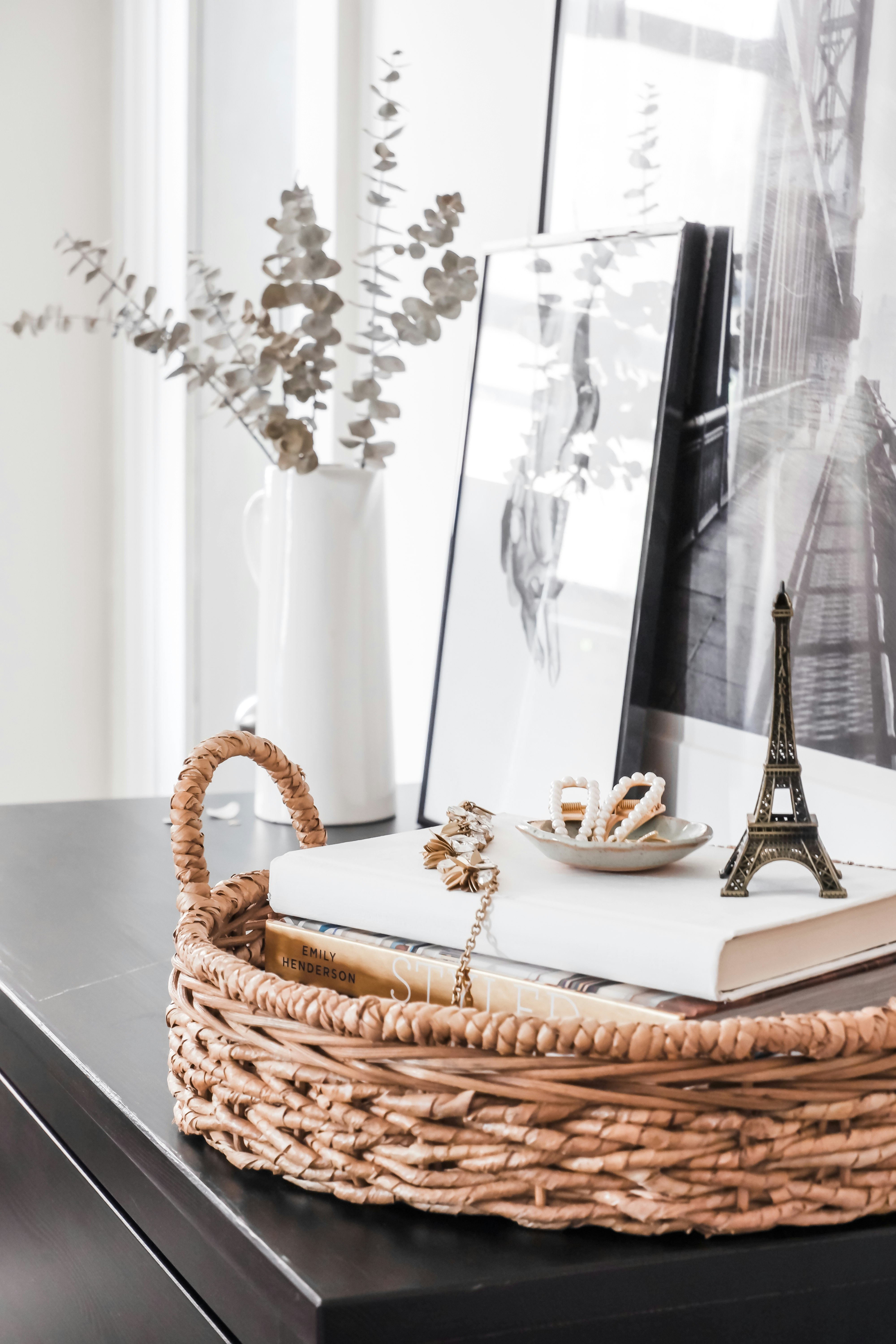 white and brown wicker basket on table